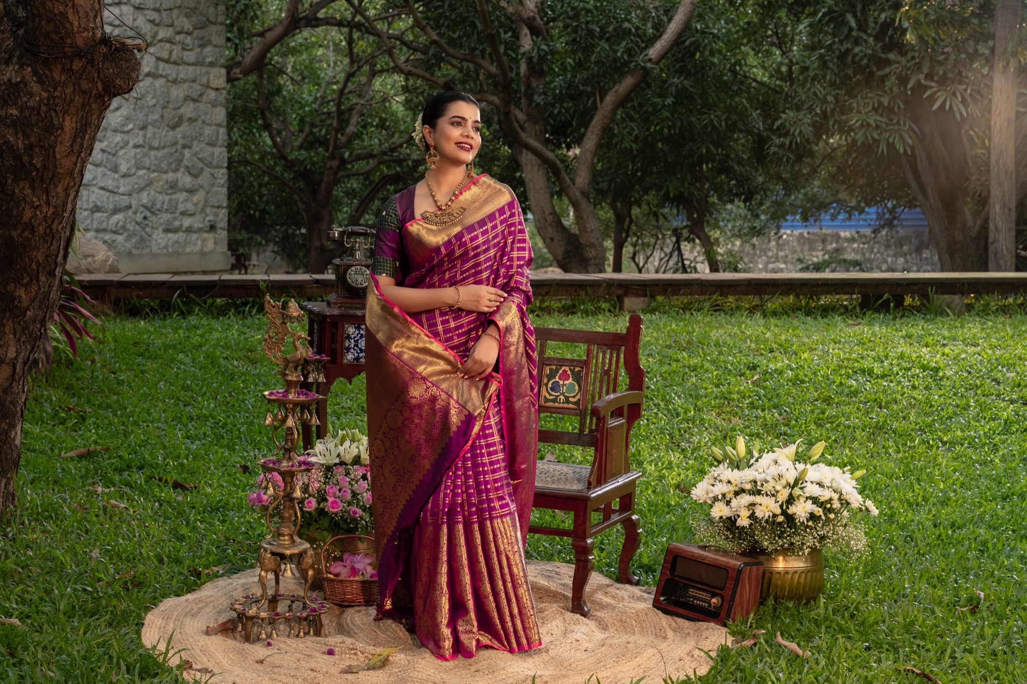 Magenta and Gold Kanjivaram Silk Saree in a Heritage Setting